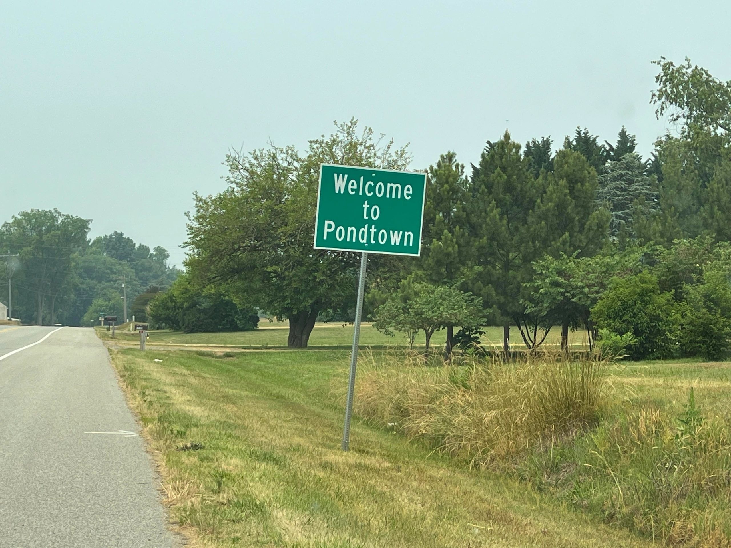 Welcome to Pondtown roadside sign